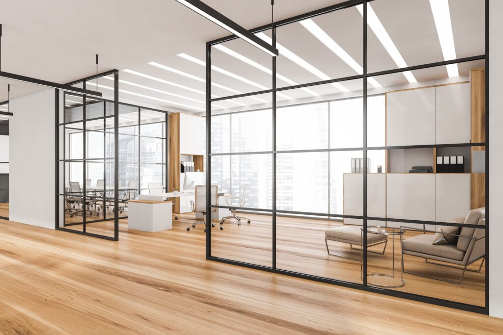 office interior with black frame glass wall partitions